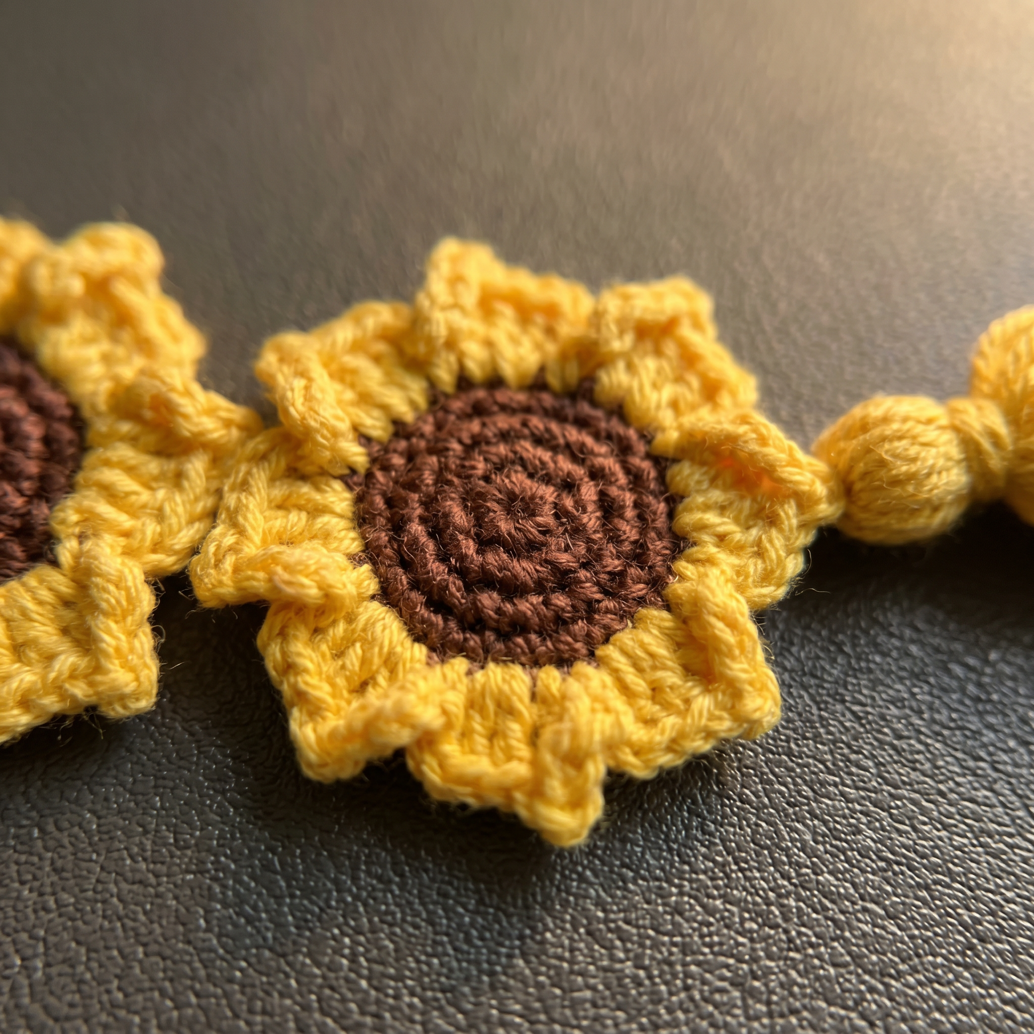 Baby Sunflower Crochet Bookmark close-up showing crochet texture and handmade details