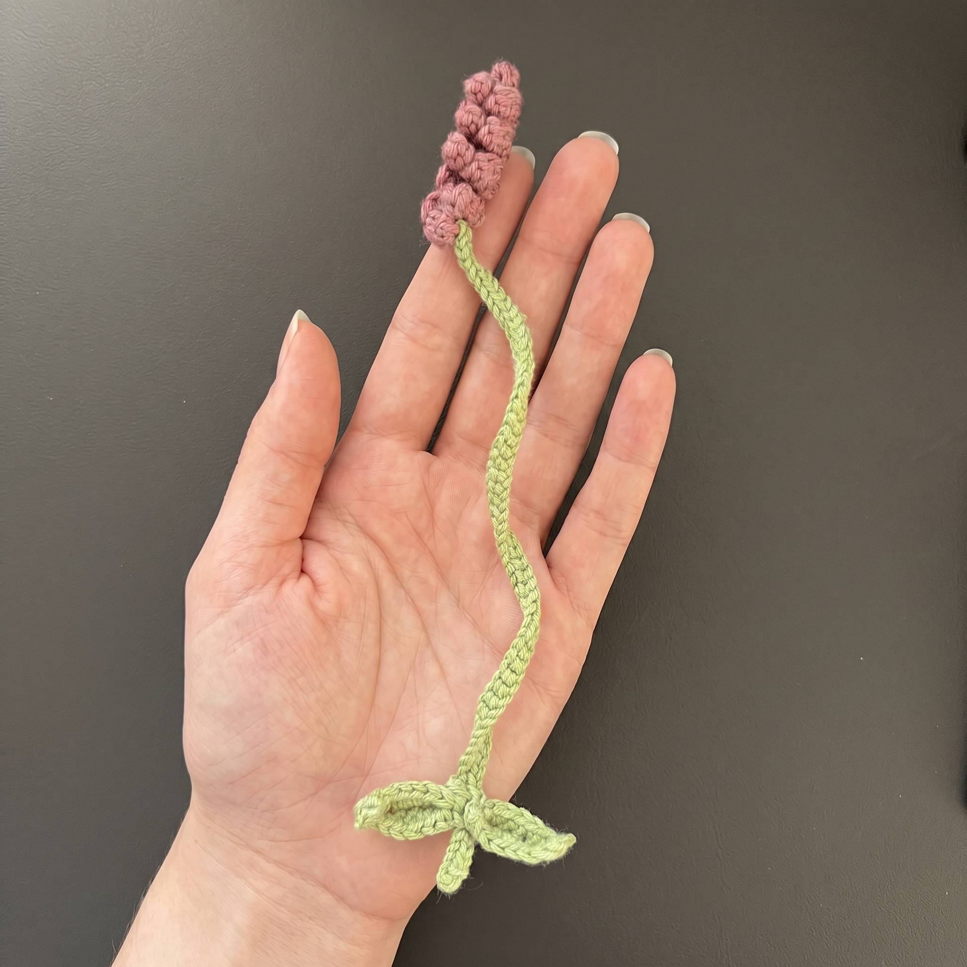 Soft Purple Lavender Crochet Bookmark held in hand to show scale
