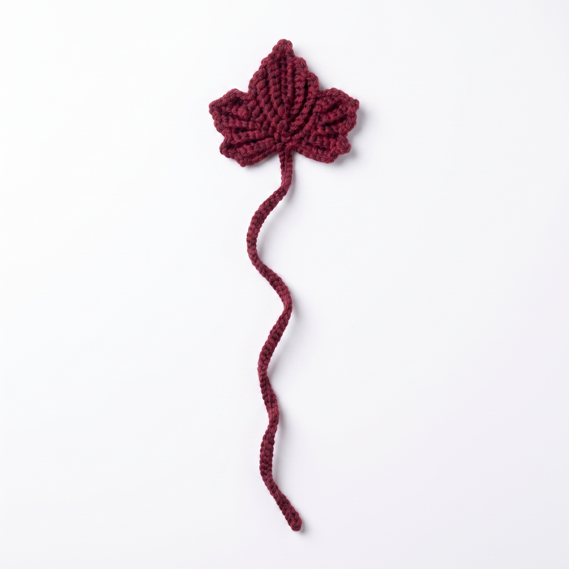 Burgundy Leaf Crochet Bookmark on a clean white background