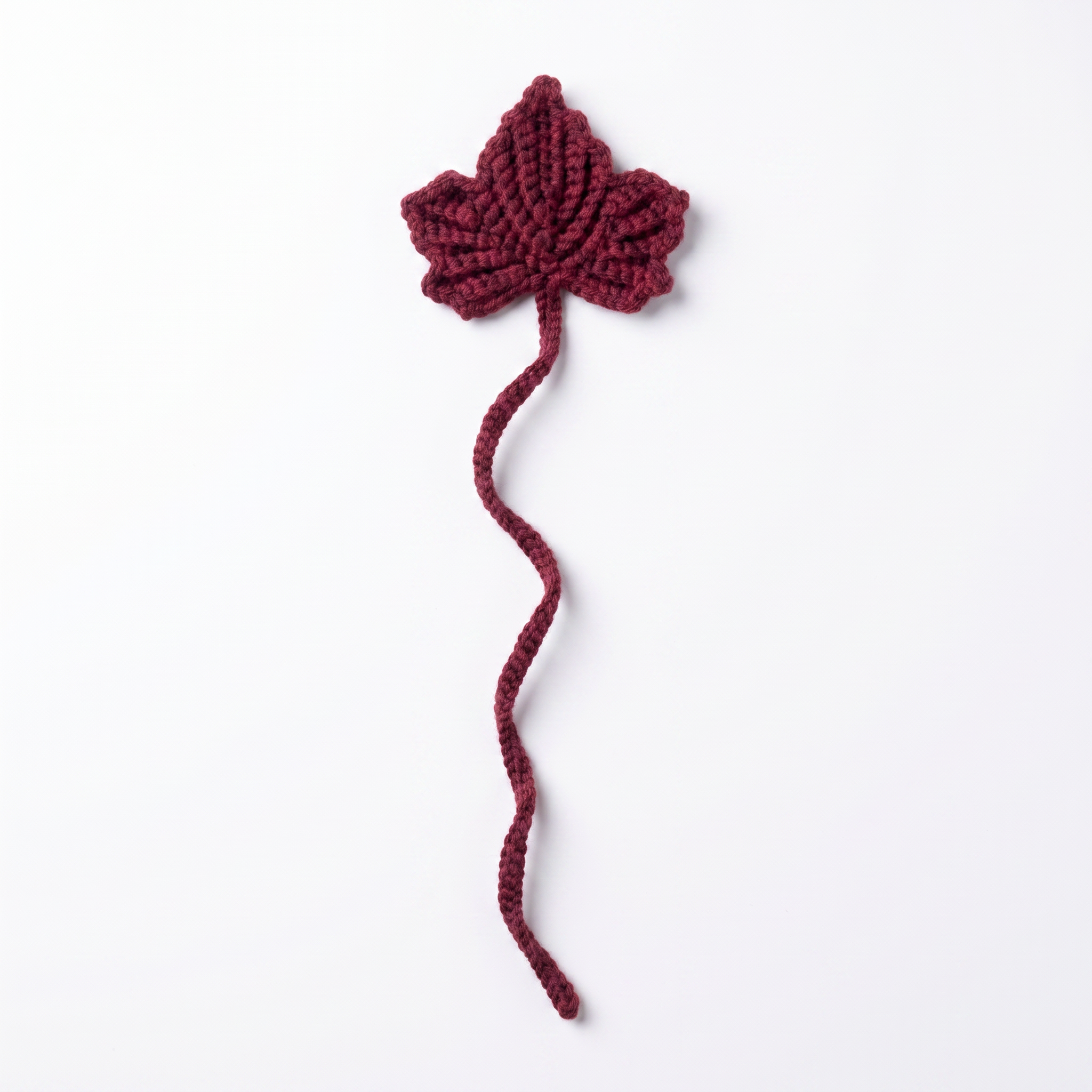 Burgundy Leaf Crochet Bookmark on a clean white background