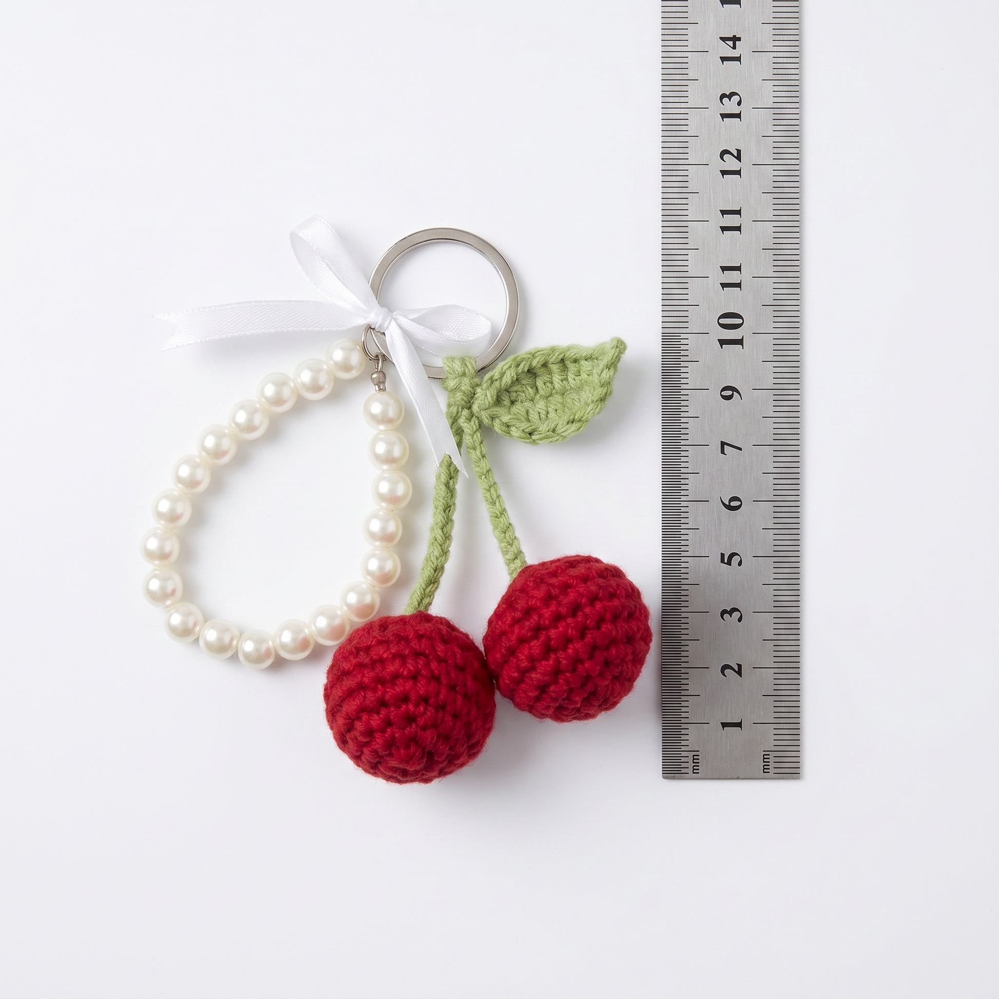 Cherry Pearl Crochet Keychain during the handmade crochet process