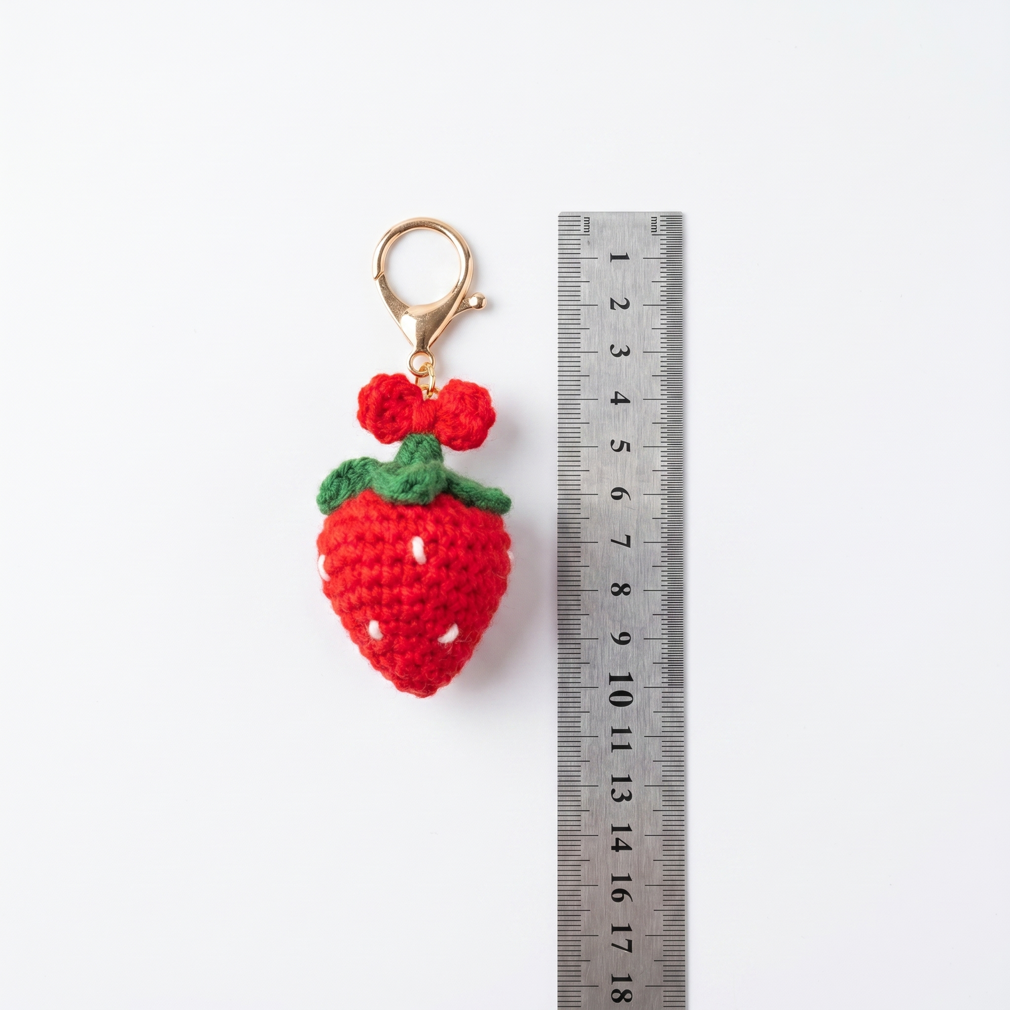 Strawberry Bow Crochet Keychain during the handmade crochet process
