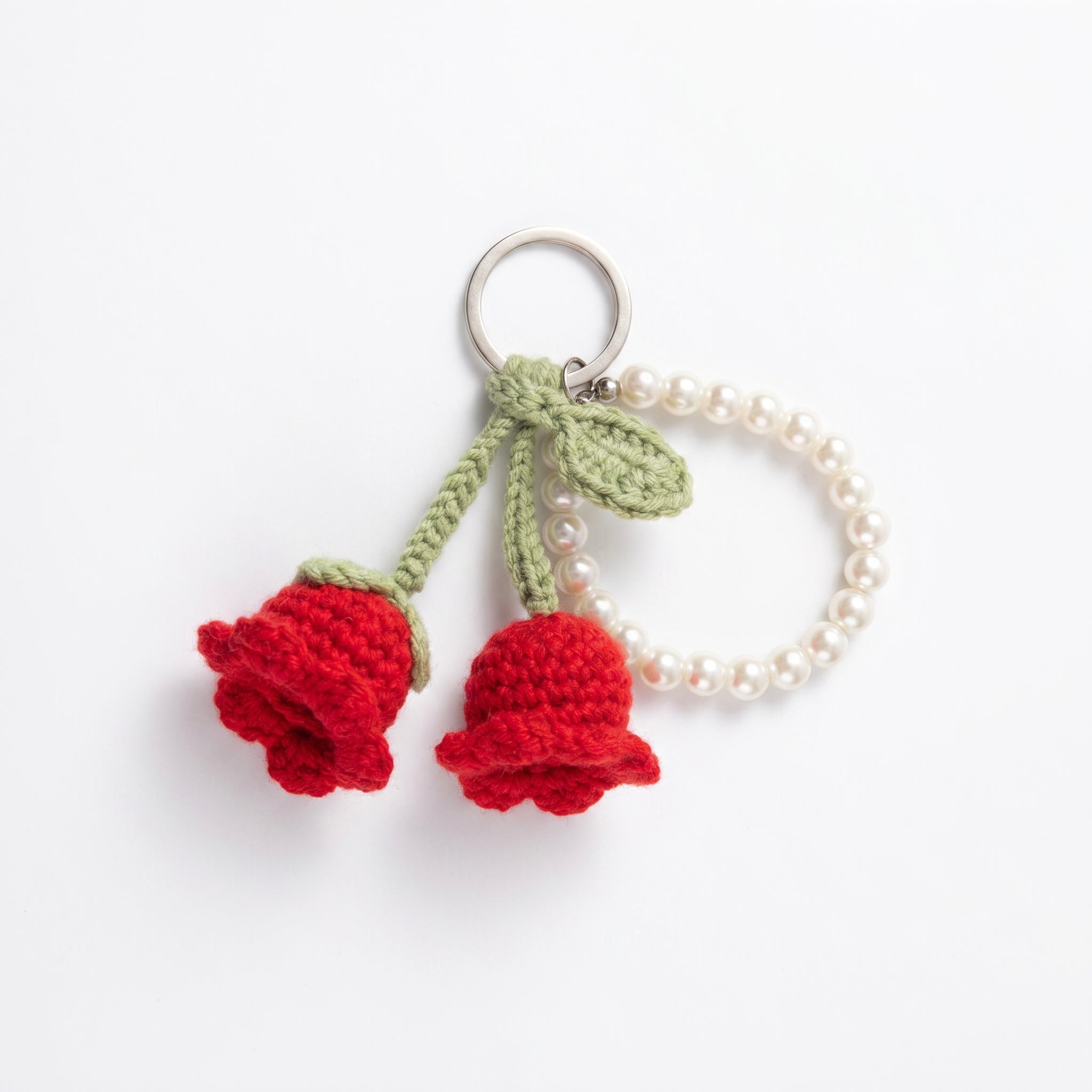 Twin Rose Pearl Crochet Keychain on a clean white background