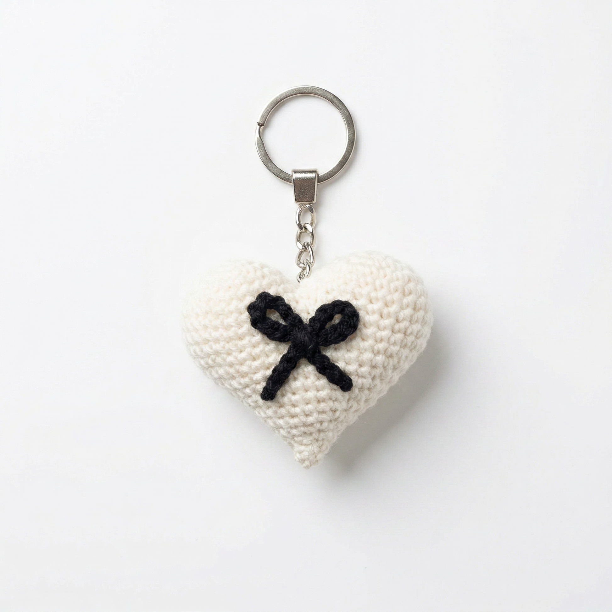 Black Bow Heart Crochet Keychain on a clean white background