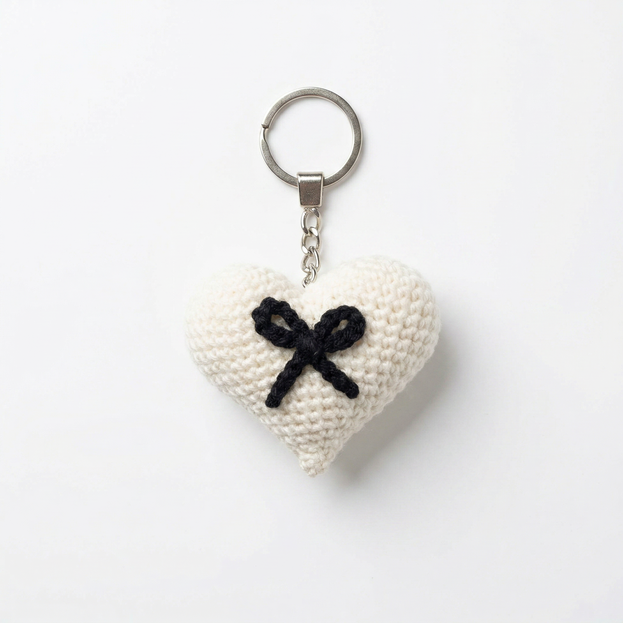 Black Bow Heart Crochet Keychain on a clean white background